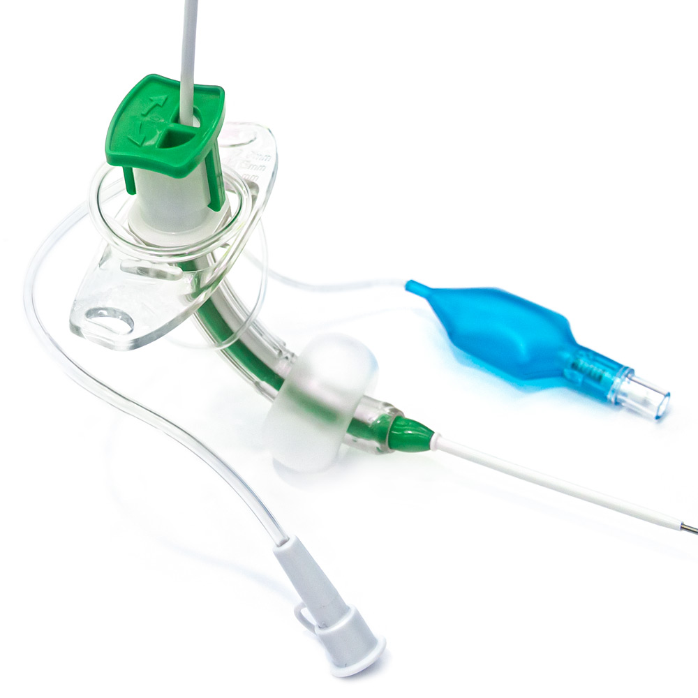 Kits with fixed flange tracheostomy tube standard or for subglottic suctioning